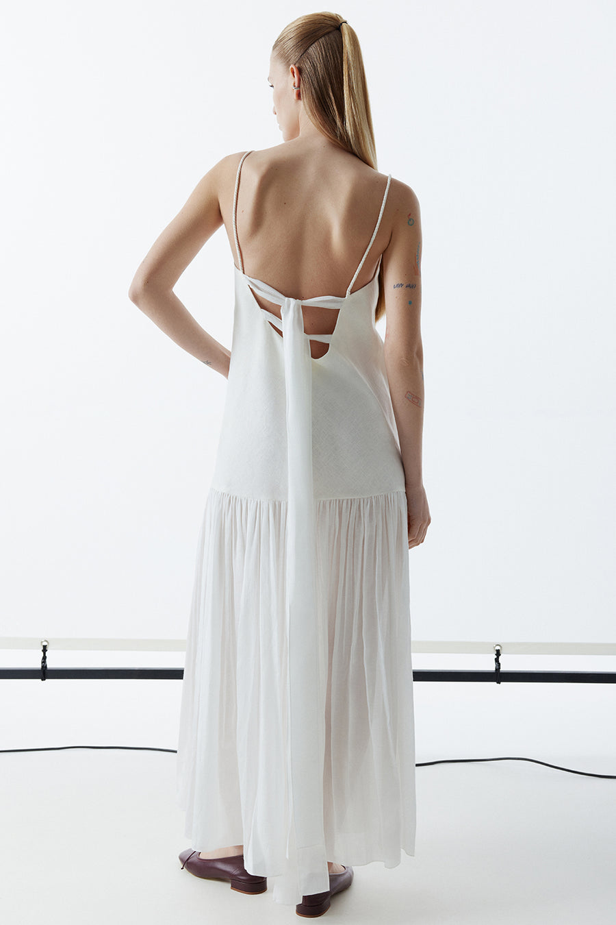 Sundress with an open back and sheer detailing